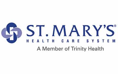 Logo of St. Mary's Health Care System with the tagline "A Member of Trinity Health." The logo includes an abstract cross symbol and the text is in blue.